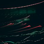 Abstract glowing lines of energy flow in dark space